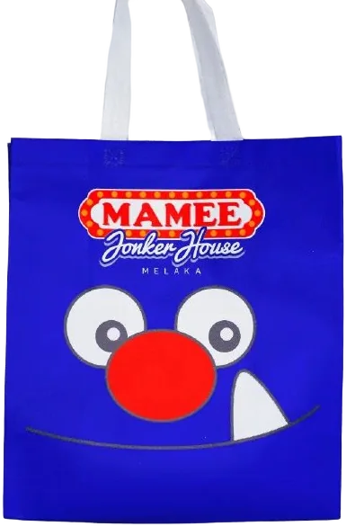 Blue tote bag printed with the Mamee Jonker House logo and a cartoon face